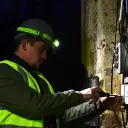 Vision-LED-Headlamp-being-used-by-worker-outside.webp