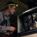 Vision-LED-Headlamp-being-used-by-worker.webp